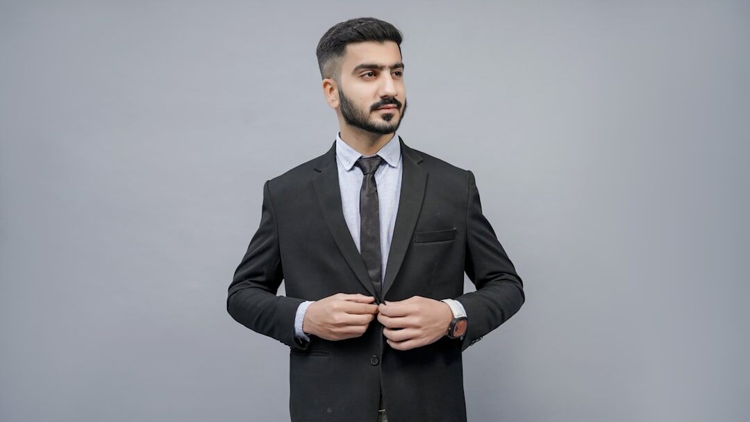 Studio portrait of a Middle Eastern businessman in a suit